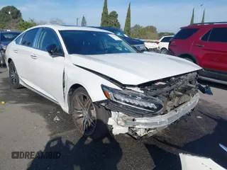 2021 Honda Accord Touring z VIN 1HGCV2F96MA004085, wystawiony jako IAAI lot #41573354 z przebiegiem 60 824 mil mil oraz . Historia ofert i sprzedaży dostępna na DreamBid. Obrazek 1.