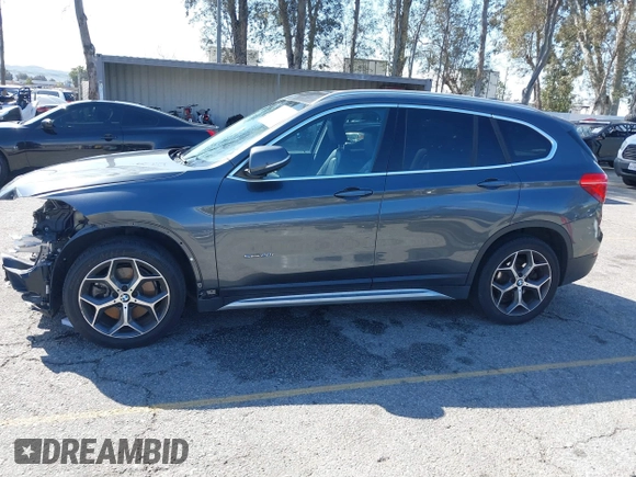 2018 BMW X1 sDrive28i with VIN WBXHU7C36J5L05628, listed as a IAAI auction lot 41708522 with 91,352 mi miles and . Bid and sale history available at DreamBid. Image 15.