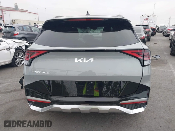 2025 Kia Sportage SX-Prestige z VIN 5XYK53DF4SG253958, wystawiony jako IAAI lot #41839577 z przebiegiem 8 205 mil mil oraz . Historia ofert i sprzedaży dostępna na DreamBid. Obrazek 17.