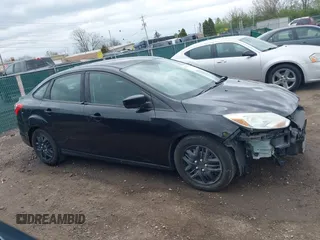 2012 Ford Focus SE with VIN 1FAHP3F27CL112277, listed as a IAAI auction lot 42053243 with 104,885 mi miles. Bid and sale history available at carsss.com. Image 14.
