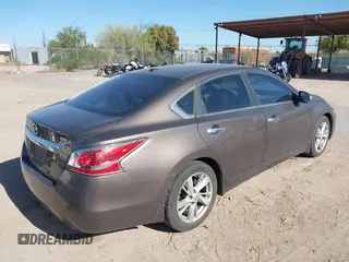 2015 Nissan Altima SV with VIN 1N4AL3AP8FC133739, listed as a IAAI auction lot 42117883 with 239,614 mi miles and . Bid and sale history available at carsss.com. Image 4.