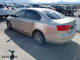 2013 Volkswagen Jetta Sedan S with VIN 3VW2K7AJ8DM242716, listed as a IAAI auction lot 41797464 with 143,030 mi miles. Bid and sale history available at carsss.com. Image 3.