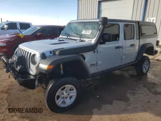 2023 Jeep Gladiator Rubicon FarOut с VIN 1C6JJTBM2PL587711, выставлен на аукционе Copart как лот 77280214 с пробегом Не указан миль и Списание • Salvage title. История ставок и продаж доступна на DreamBid. Изображение 1.