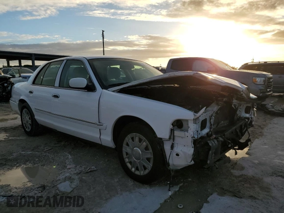 2006 Mercury Grand Marquis GS z VIN 2MEFM74V26X621309, wystawiony jako Copart lot #76454214 z przebiegiem 59 171 mil mil oraz Szkoda całkowita • Salvage title. Historia ofert i sprzedaży dostępna na DreamBid. Obrazek 4.