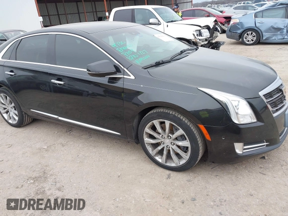2017 Cadillac XTS Luxury with VIN 2G61M5S39H9166549, listed as a IAAI auction lot 41593859 with 164,557 mi miles. Bid and sale history available at carsss.com. Image 1.