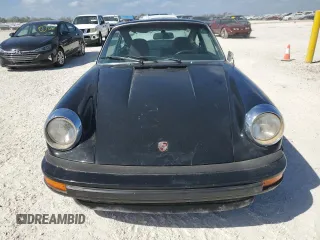 1975 Porsche 911 with VIN 9115202267, listed as a Copart auction lot 75863884 with 61,298 mi miles and Salvage title. Bid and sale history available at DreamBid. Image 5.