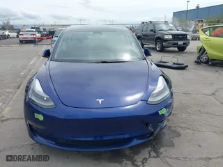 2021 Tesla Model 3 Long Range with VIN 5YJ3E1EB6MF878411, listed as a IAAI auction lot 41986947 with 71,978 mi miles. Bid and sale history available at carsss.com. Image 13.