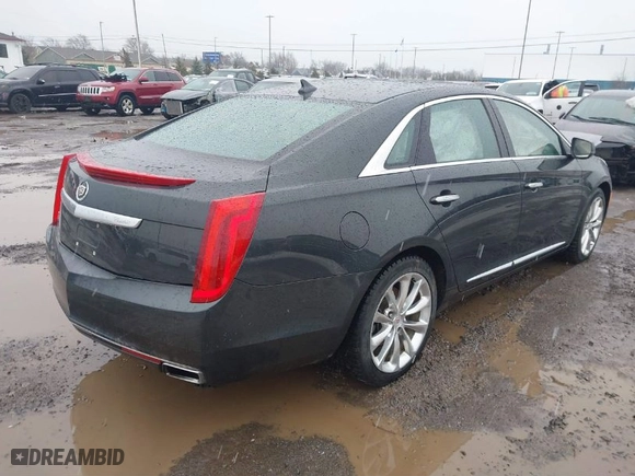 2013 Cadillac XTS Luxury with VIN 2G61R5S35D9100771, listed as a IAAI auction lot 41673766 with 41,123 mi miles. Bid and sale history available at carsss.com. Image 4.