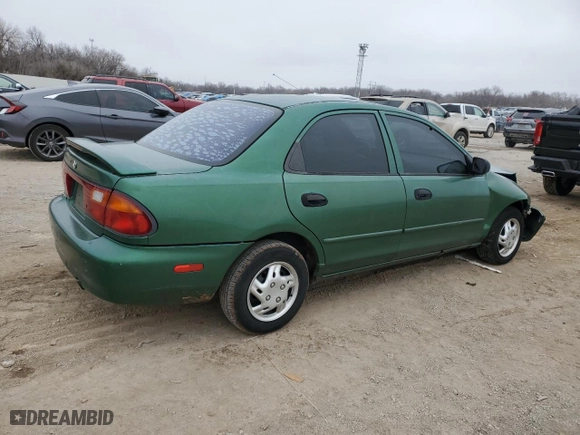 1996 Mazda Protege DX with VIN JM1BB1418T0330159, listed as a Copart auction lot 43815085 with 231,618 mi miles and Salvage Title. Bid and sale history available at carsss.com. Image 3.