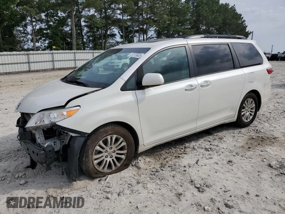 2016 Toyota Sienna XLE with VIN 5TDYK3DC3GS730639, listed as a Copart auction lot 57379935 with 105,323 mi miles and Salvage title. Bid and sale history available at DreamBid. Image 1.