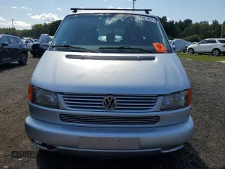 2003 Volkswagen EuroVan MV с VIN WV2MB47023H044047, выставлен на аукционе Copart как лот 71014624 с пробегом 189 485 миль миль и Чистый • Clean title. История ставок и продаж доступна на DreamBid. Изображение 5.