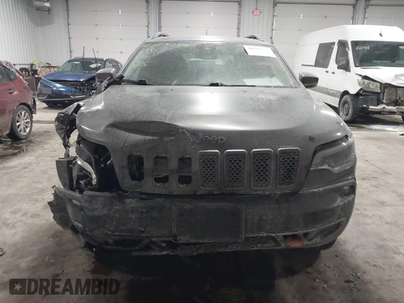 2021 Jeep Cherokee Trailhawk z VIN 1C4PJMBX4MD148597, wystawiony jako IAAI lot #41622099 z przebiegiem 48 452 mil mil oraz . Historia ofert i sprzedaży dostępna na DreamBid. Obrazek 12.