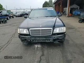 1996 Mercedes-Benz C z VIN WDBHA28E5TF452117, wystawiony jako Copart lot #64761835 z przebiegiem 174 778 mil mil oraz Nie do naprawy • Non repairable. Historia ofert i sprzedaży dostępna na DreamBid. Obrazek 14.