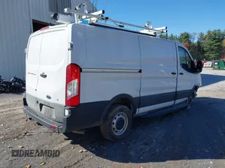 2023 Ford Transit Cargo with VIN 1FTBR1Y86PKA79798, listed as a IAAI auction lot 40155361 with 28,670 mi miles and . Bid and sale history available at DreamBid. Image 4.