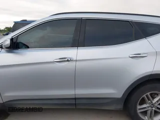 2017 Hyundai Santa Fe 2.4L with VIN 5XYZU3LB4HG464876, listed as a IAAI auction lot 42693100 with 127,888 mi miles and . Bid and sale history available at DreamBid. Image 14.
