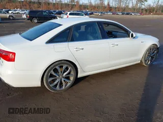2015 Audi A6 3.0T Premium Plus with VIN WAUFGAFC9FN007079, listed as a IAAI auction lot 41496754 with 69,357 mi miles. Bid and sale history available at carsss.com. Image 4.