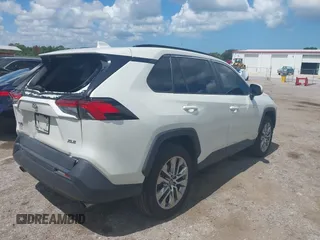 2021 Toyota RAV4 XLE Premium with VIN 2T3C1RFV0MW107651, listed as a IAAI auction lot 42558254 with 68,286 mi miles and . Bid and sale history available at DreamBid. Image 4.