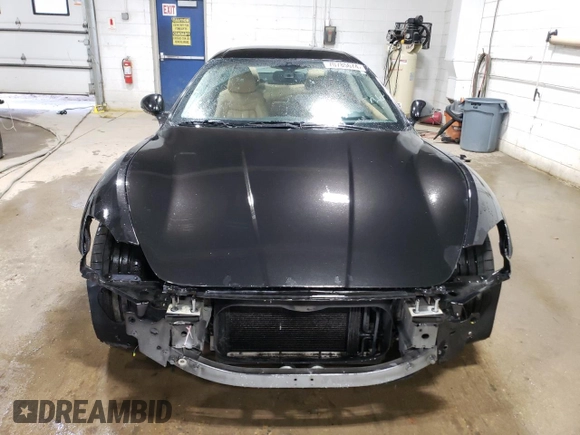 2009 Maserati GranTurismo с VIN ZAMGJ45A190042805, выставлен на аукционе Copart как лот 70785674 с пробегом 71 810 миль миль и Списание • Salvage title. История ставок и продаж доступна на DreamBid. Изображение 5.