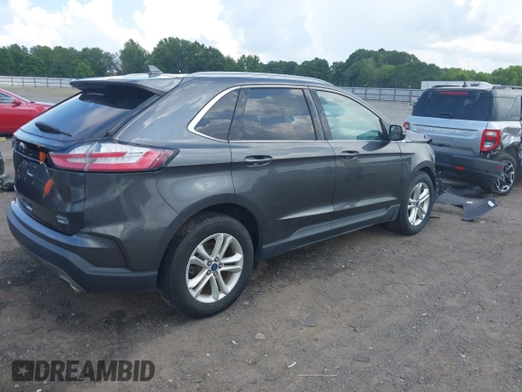 2020 Ford Edge SEL z VIN 2FMPK4J98LBA29600, wystawiony jako IAAI lot #42547635 z przebiegiem 82 222 mil mil oraz . Historia ofert i sprzedaży dostępna na DreamBid. Obrazek 4.