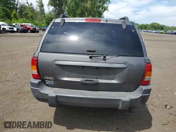 2004 Jeep Grand Cherokee Laredo with VIN 1J4GW48S64C291404, listed as a Copart auction lot 62835335 with 170,365 mi miles and Salvage title. Bid and sale history available at DreamBid. Image 6.