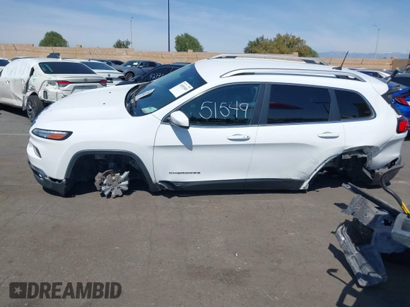 2016 Jeep Cherokee High Altitude with VIN 1C4PJLDB0GW249558, listed as a IAAI auction lot 41851549 with 128,638 mi miles. Bid and sale history available at carsss.com. Image 18.