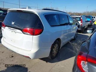2017 Chrysler Pacifica Touring L with VIN 2C4RC1BG8HR677720, listed as a IAAI auction lot 41976606 with 170,175 mi miles and . Bid and sale history available at DreamBid. Image 4.
