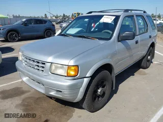 1998 Isuzu Rodeo S with VIN 4S2CM58WXW4325350, listed as a IAAI auction lot 42084411 with 292,784 mi miles. Bid and sale history available at carsss.com. Image 2.