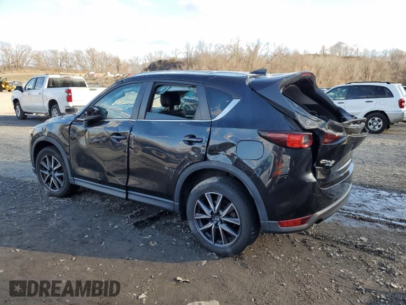 2018 Mazda CX-5 Touring with VIN JM3KFBCM3J0382258, listed as a Copart auction lot 50463005 with 61,887 mi miles and Salvage Title. Bid and sale history available at carsss.com. Image 2.