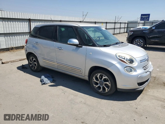 2014 FIAT 500L Lounge with VIN ZFBCFACHXEZ008504, listed as a Copart auction lot 64678195 with 98,957 mi miles and Salvage title. Bid and sale history available at DreamBid. Image 4.