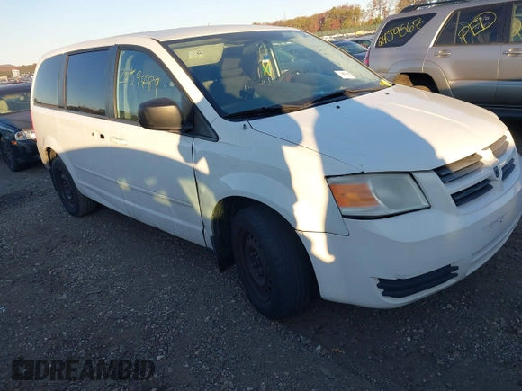 2010 Dodge Grand Caravan SE with VIN 2D4RN4DE8AR498559, listed as a IAAI auction lot 40886502 with Not Provided miles and . Bid and sale history available at DreamBid. Image 1.