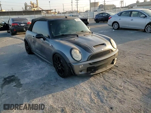 2008 MINI Convertible S z VIN WMWRH33558TJ45177, wystawiony jako Copart lot #79543814 z przebiegiem 102 421 mil mil oraz Szkoda całkowita • Salvage title. Historia ofert i sprzedaży dostępna na DreamBid. Obrazek 11.