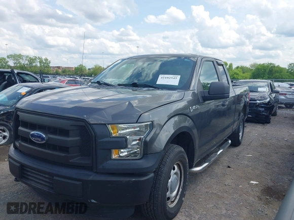 2015 Ford F-150 XLT with VIN 1FTEX1E89FKD84587, listed as a IAAI auction lot 42102545 with 141,265 mi miles. Bid and sale history available at carsss.com. Image 17.