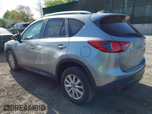 2014 Mazda CX-5 Touring with VIN JM3KE4CY0E0302583, listed as a IAAI auction lot 41947735 with 122,077 mi miles. Bid and sale history available at carsss.com. Image 3.