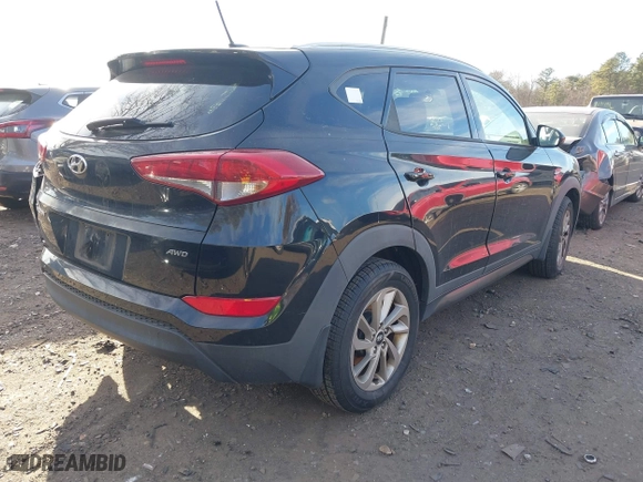 2016 Hyundai Tucson SE with VIN KM8J3CA45GU051376, listed as a IAAI auction lot 41251762 with 169,354 mi miles. Bid and sale history available at carsss.com. Image 4.
