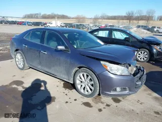 2015 Chevrolet Malibu LT with VIN 1G11D5SL0FF208469, listed as a IAAI auction lot 41673121 with 169,146 mi miles. Bid and sale history available at carsss.com. Image 1.