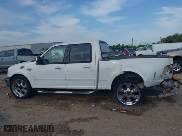 2001 Ford F-150 XLT with VIN 1FTRW07L81KE91672, listed as a IAAI auction lot 42021661 with 200,000 mi miles and . Bid and sale history available at DreamBid. Image 14.
