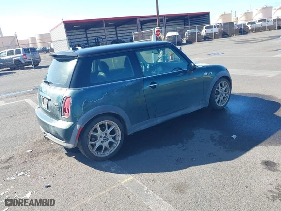 2006 MINI Cooper Hardtop S with VIN WMWRE33566TJ34081, listed as a IAAI auction lot 41265659 with 71,441 mi miles. Bid and sale history available at carsss.com. Image 4.