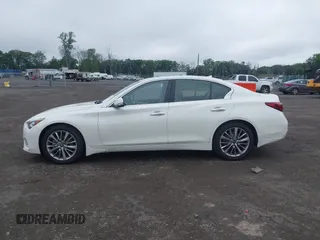 2023 Infiniti Q50 Luxe with VIN JN1EV7BR5PM541157, listed as a IAAI auction lot 42452178 with 60,271 mi miles and . Bid and sale history available at DreamBid. Image 14.