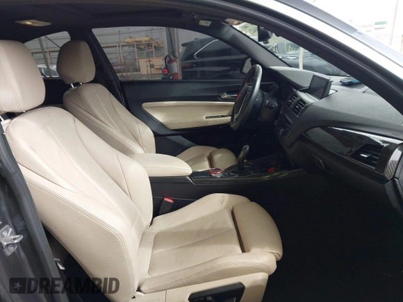 2014 BMW 2 Series 228i with VIN WBA1F5C5XEV255284, listed as a IAAI auction lot 41895642 with 62,079 mi miles and . Bid and sale history available at carsss.com. Image 5.