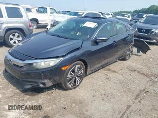 2016 Honda Civic EX-L with VIN 19XFC1F79GE003492, listed as a IAAI auction lot 42563306 with 166,420 mi miles and . Bid and sale history available at DreamBid. Image 2.