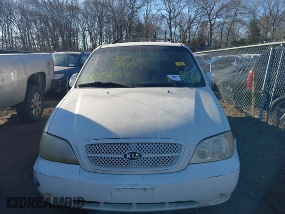 2005 Kia Sedona LX with VIN KNDUP132756764528, listed as a IAAI auction lot 41709414 with 999,999 mi miles. Bid and sale history available at carsss.com. Image 6.