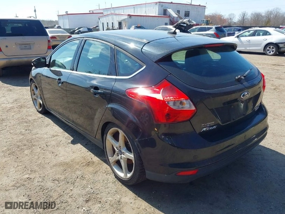 2012 Ford Focus Titanium with VIN 1FAHP3N25CL428522, listed as a IAAI auction lot 41773538 with NaN miles. Bid and sale history available at carsss.com. Image 3.