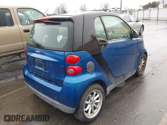 2008 Smart fortwo Pure z VIN WMEEJ31X28K195424, wystawiony jako IAAI lot #41789426 z przebiegiem 136 756 mil mil oraz . Historia ofert i sprzedaży dostępna na DreamBid. Obrazek 4.