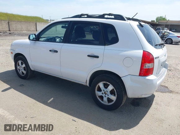 2006 Hyundai Tucson GL with VIN KM8JM12B76U412698, listed as a IAAI auction lot 42055377 with 177,459 mi miles. Bid and sale history available at carsss.com. Image 3.