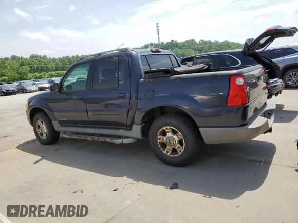 2001 Ford Explorer Sport Trac z VIN 1FMZU77E81UA92437, wystawiony jako Copart lot #57461165 z przebiegiem 275 633 mil mil oraz Czysty tytuł • Clean title. Historia ofert i sprzedaży dostępna na DreamBid. Obrazek 2.