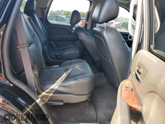 2014 Chevrolet Tahoe LTZ z VIN 1GNSCCE0XER103558, wystawiony jako Copart lot #67590424 z przebiegiem Nie podano mil oraz Szkoda całkowita • Salvage title. Historia ofert i sprzedaży dostępna na DreamBid. Obrazek 11.