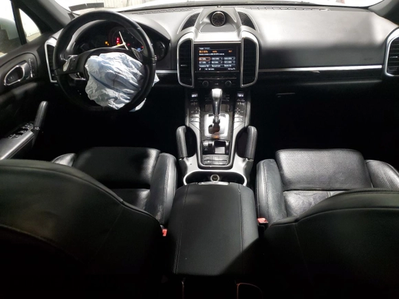 2014 Porsche Cayenne с VIN WP1AA2A21ELA00526, выставлен на аукционе Copart как лот 54238525 с пробегом 101 437 миль миль и Списание • Salvage title. История ставок и продаж доступна на DreamBid. Изображение 8.