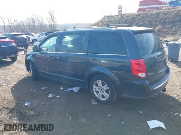 2013 Dodge Grand Caravan Crew with VIN 2C4RDGDG8DR795483, listed as a IAAI auction lot 41781570 with 188,098 mi miles and . Bid and sale history available at DreamBid. Image 3.