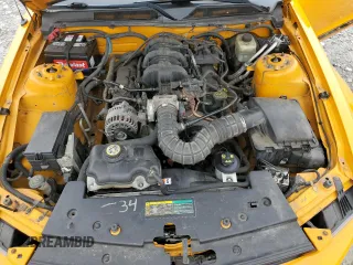 2007 Ford Mustang Deluxe z VIN 1ZVFT80N675218322, wystawiony jako Copart lot #58667435 z przebiegiem 159 320 mil mil oraz Czysty tytuł • Clean title. Historia ofert i sprzedaży dostępna na DreamBid. Obrazek 11.
