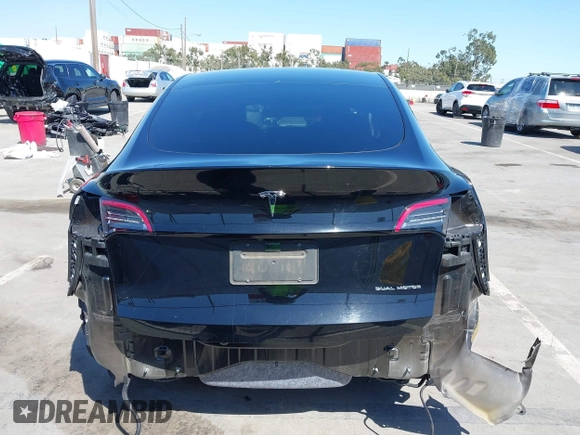 2022 Tesla Model Y Long Range with VIN 7SAYGDEE6NF480471, listed as a IAAI auction lot 41985797 with 82,777 mi miles and . Bid and sale history available at DreamBid. Image 6.